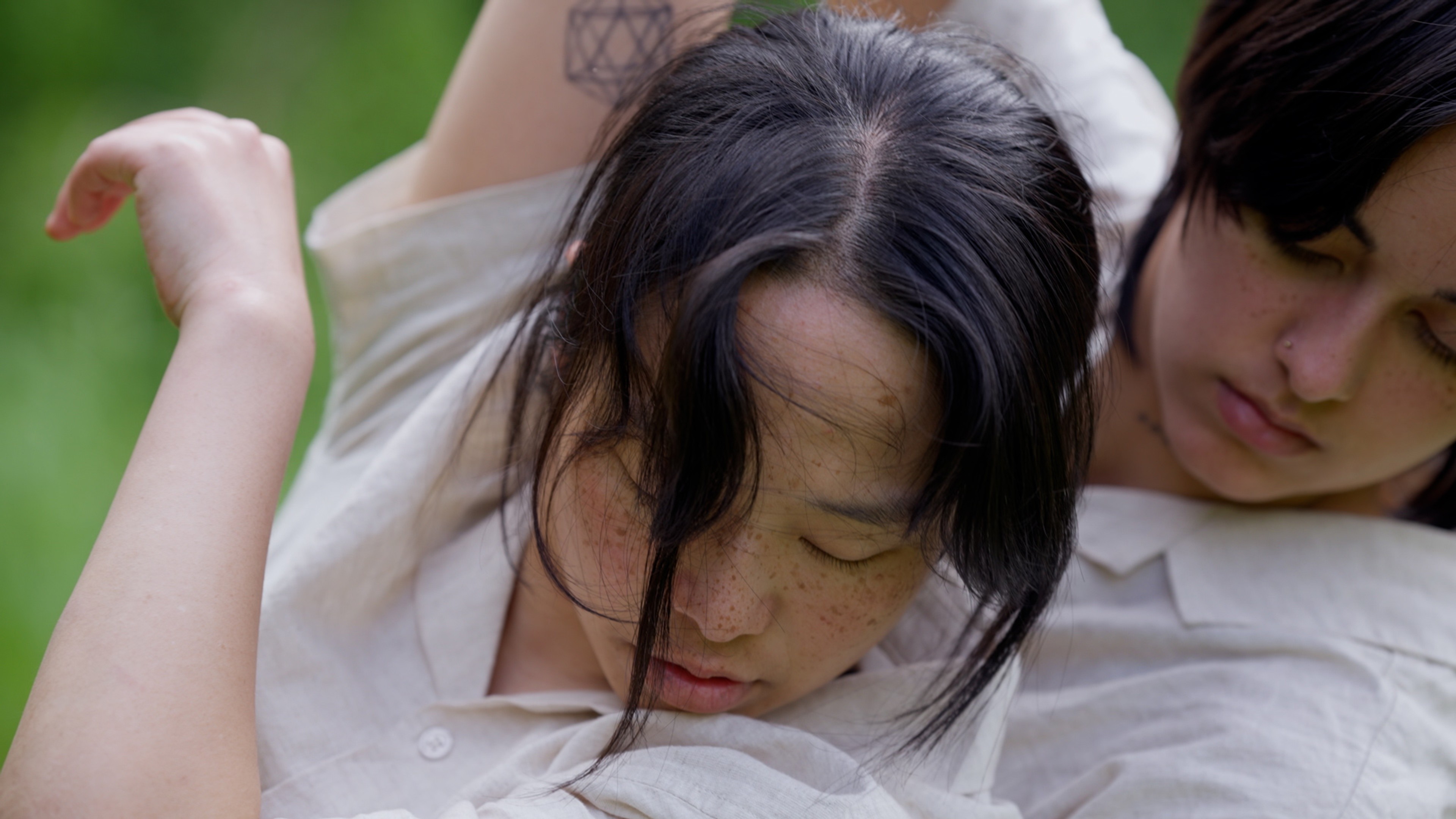 Two people locked in an embrace.