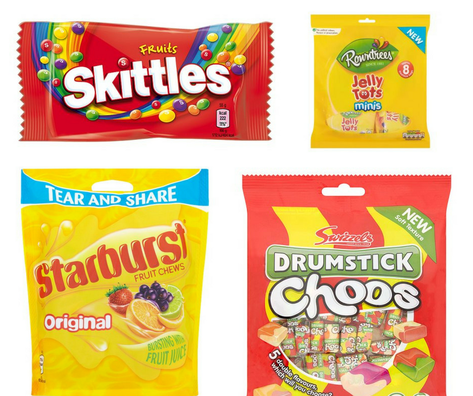 A selection of vegan friendly sweets - Skittles, Jelly Tots, Starburst, Drumstick