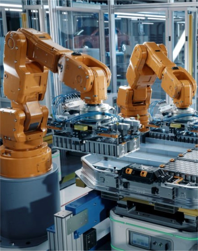 Robotic arms assembling an EV battery pack at a commercial scale plant. Catalyst is helping companies reach this stage and learn by doing.