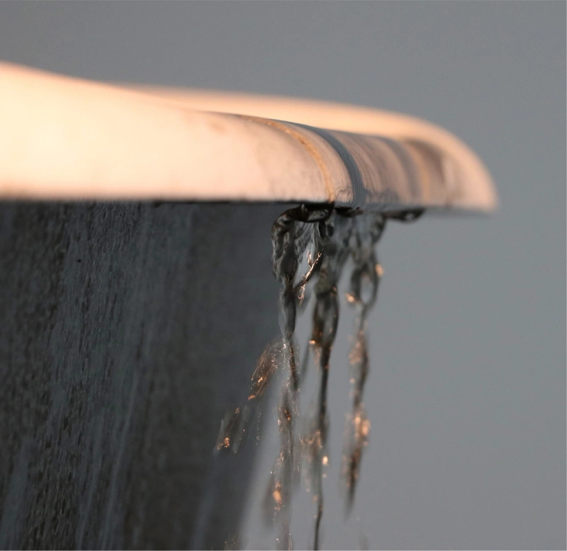A bathtub overflowing with water