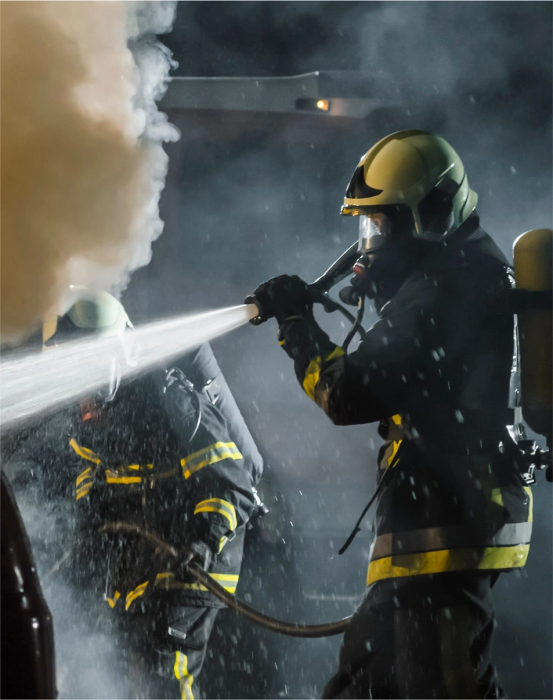 A firefighter battling a blaze