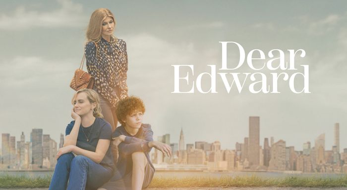 Cast of Dear Edward seated on a curb in key art poster
