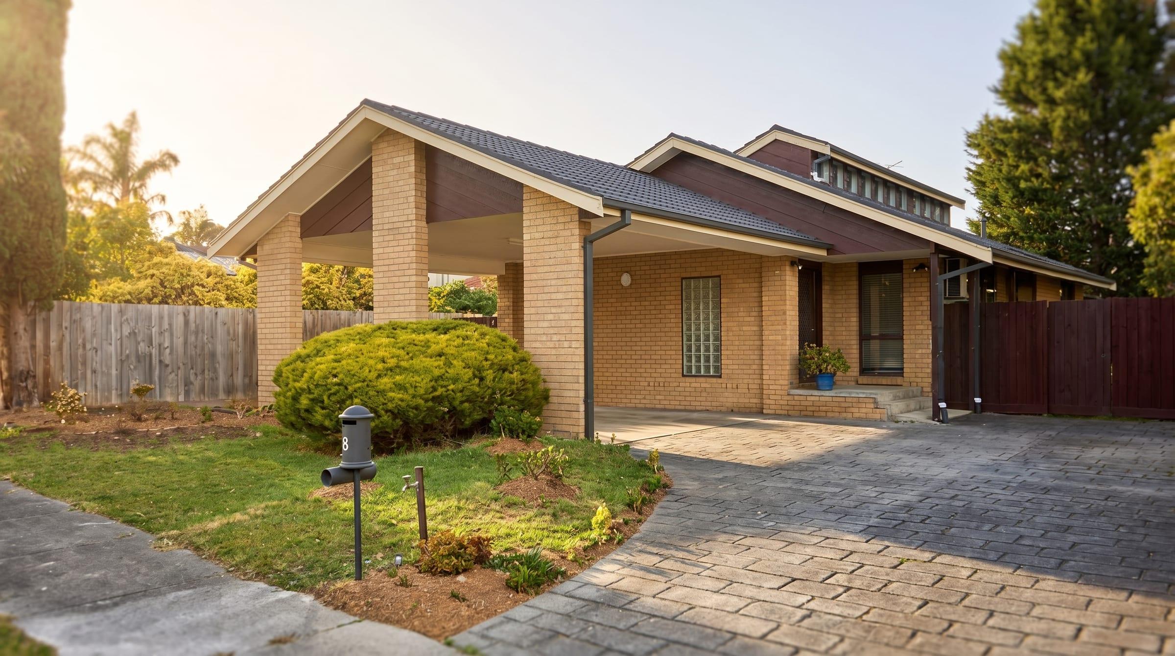 Front exterior of Rowville, an NDIS Supported Independent Living home provided by Myxa — captured in warm late-afternoon light with editorial real-estate photography quality.