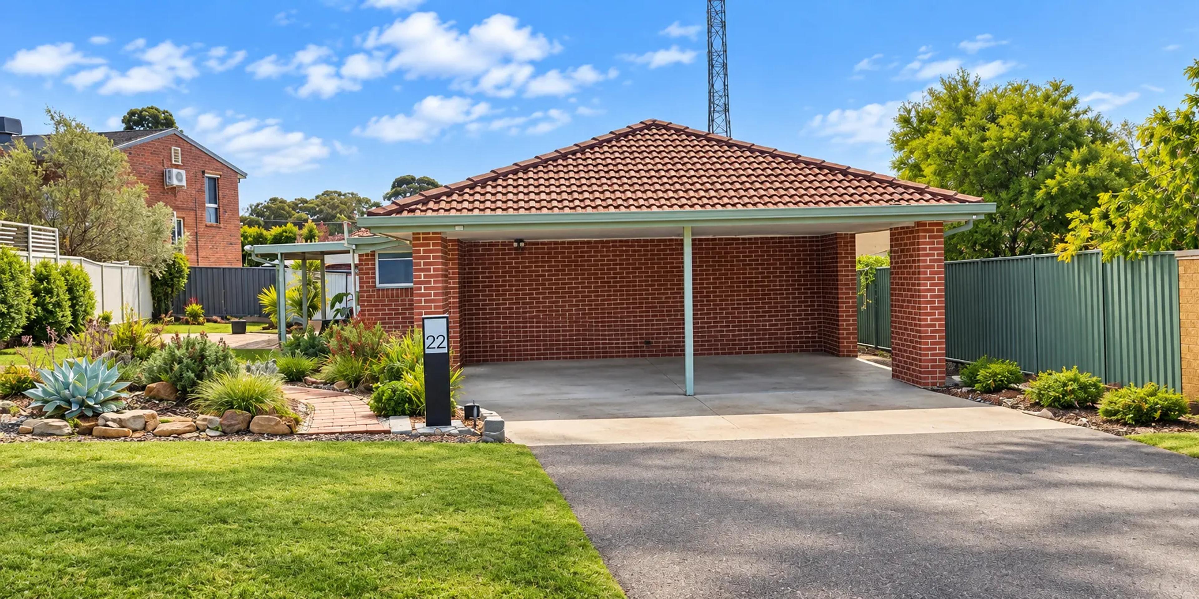 Golden Square Druid front exterior with carport, driveway and landscaped garden