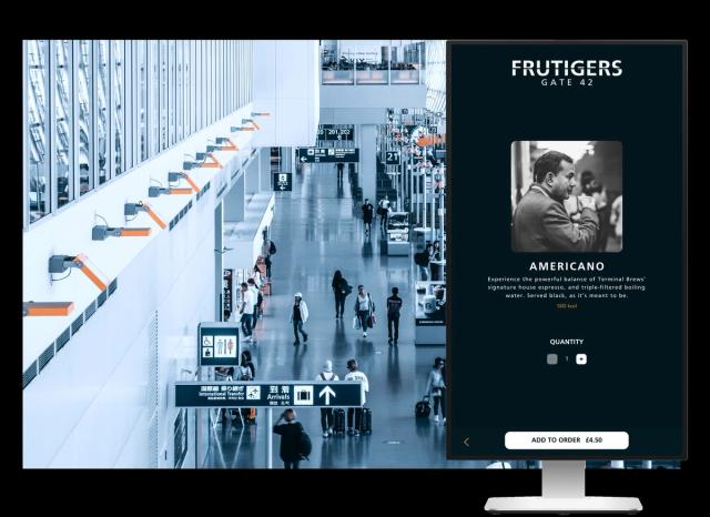 A QikServe kiosk standing in an airport concourse, showing a coffee product page