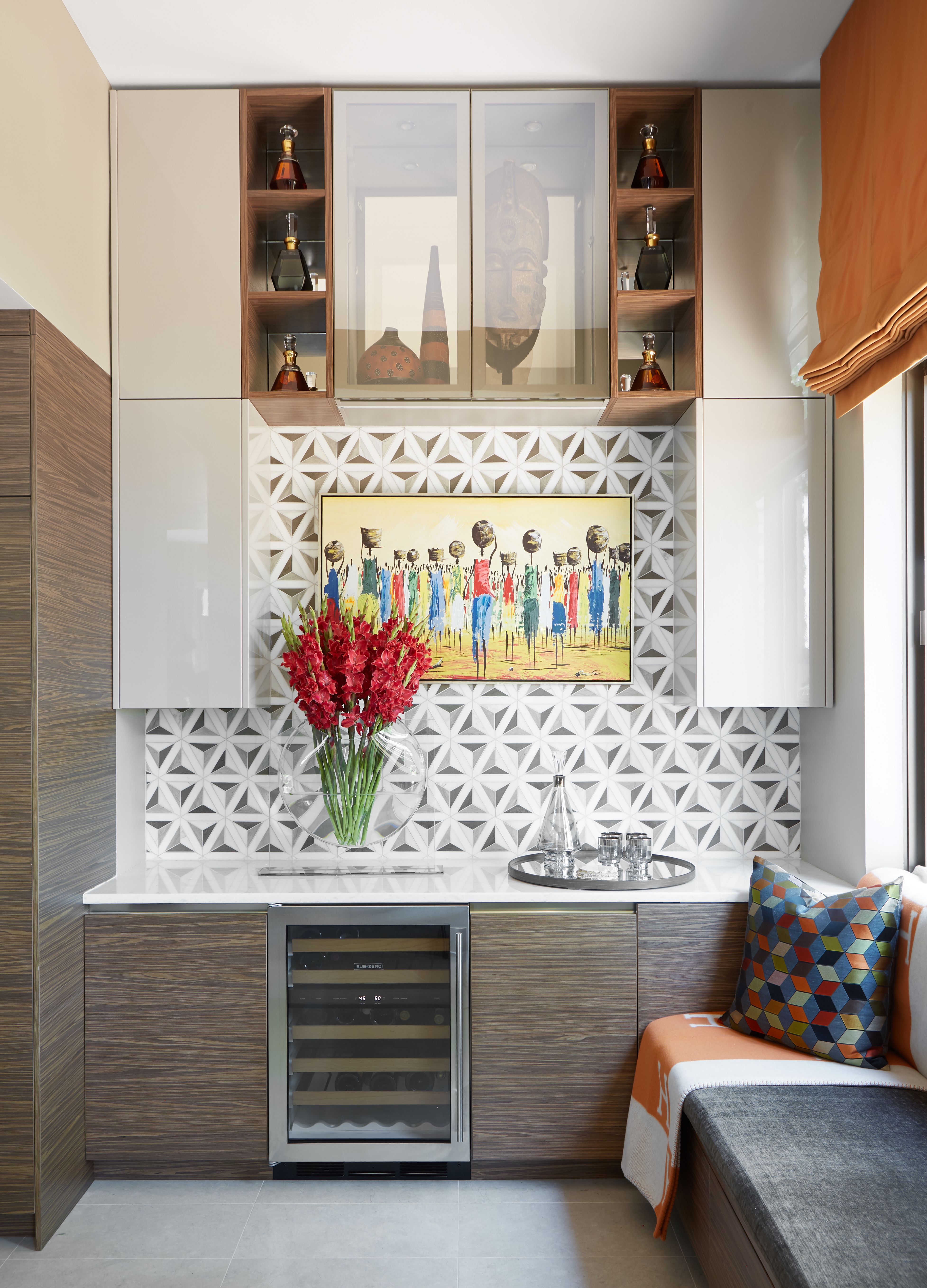 Existing artworks were custom-framed, while artifacts and accessories were expertly sourced from art fairs and showrooms.