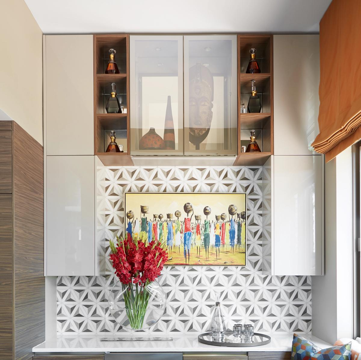 Existing artworks were custom-framed, while artifacts and accessories were expertly sourced from art fairs and showrooms.