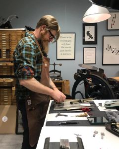 Sakari Männistö at work in the Letterpress House Turku printing press