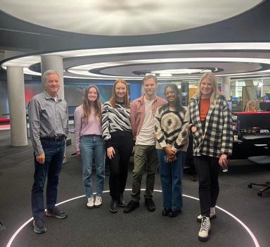 Group of students in front of a TV studio