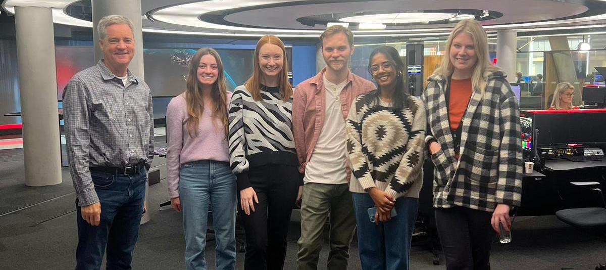 Group of students in front of a TV studio