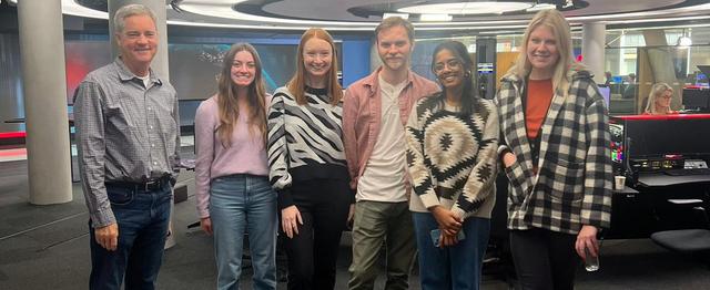Group of students in front of a TV studio