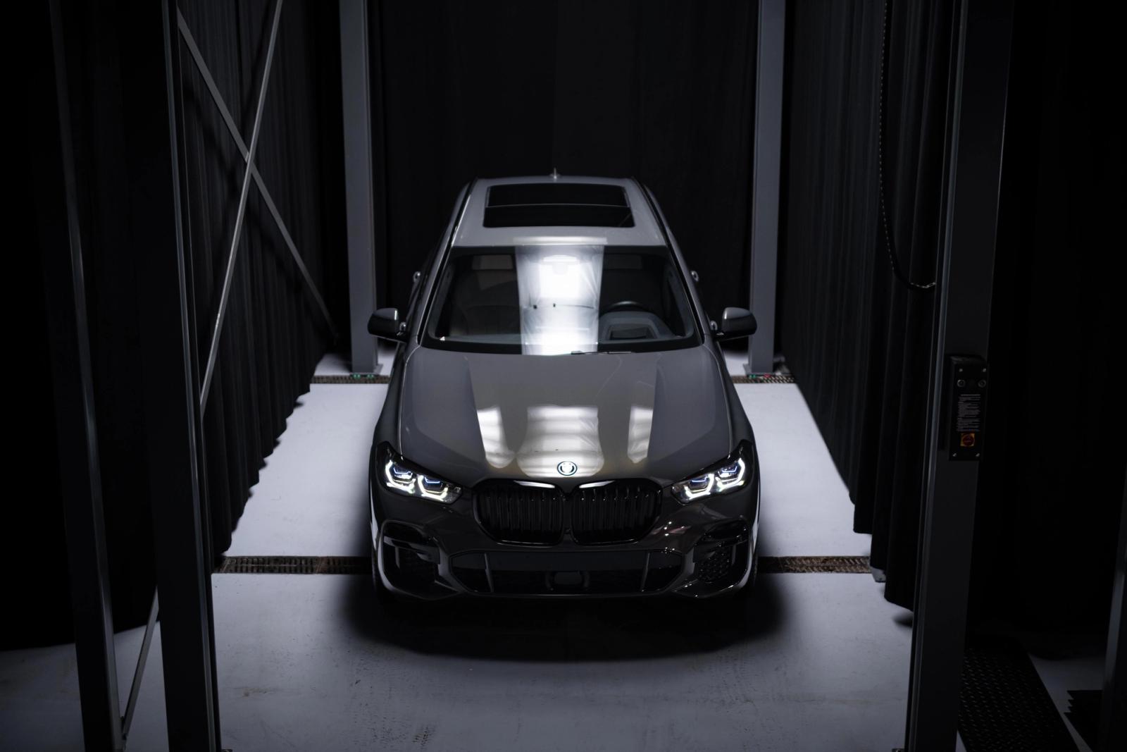 BMW X5 under studio lighting at Charlie Detailing in Utrecht, ready for paint protection film