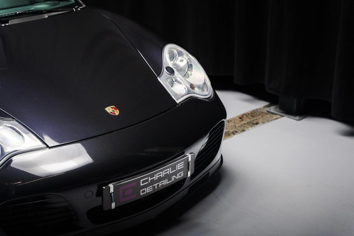 Front of a Porsche 996 Turbo in storage at Charlie Detailing