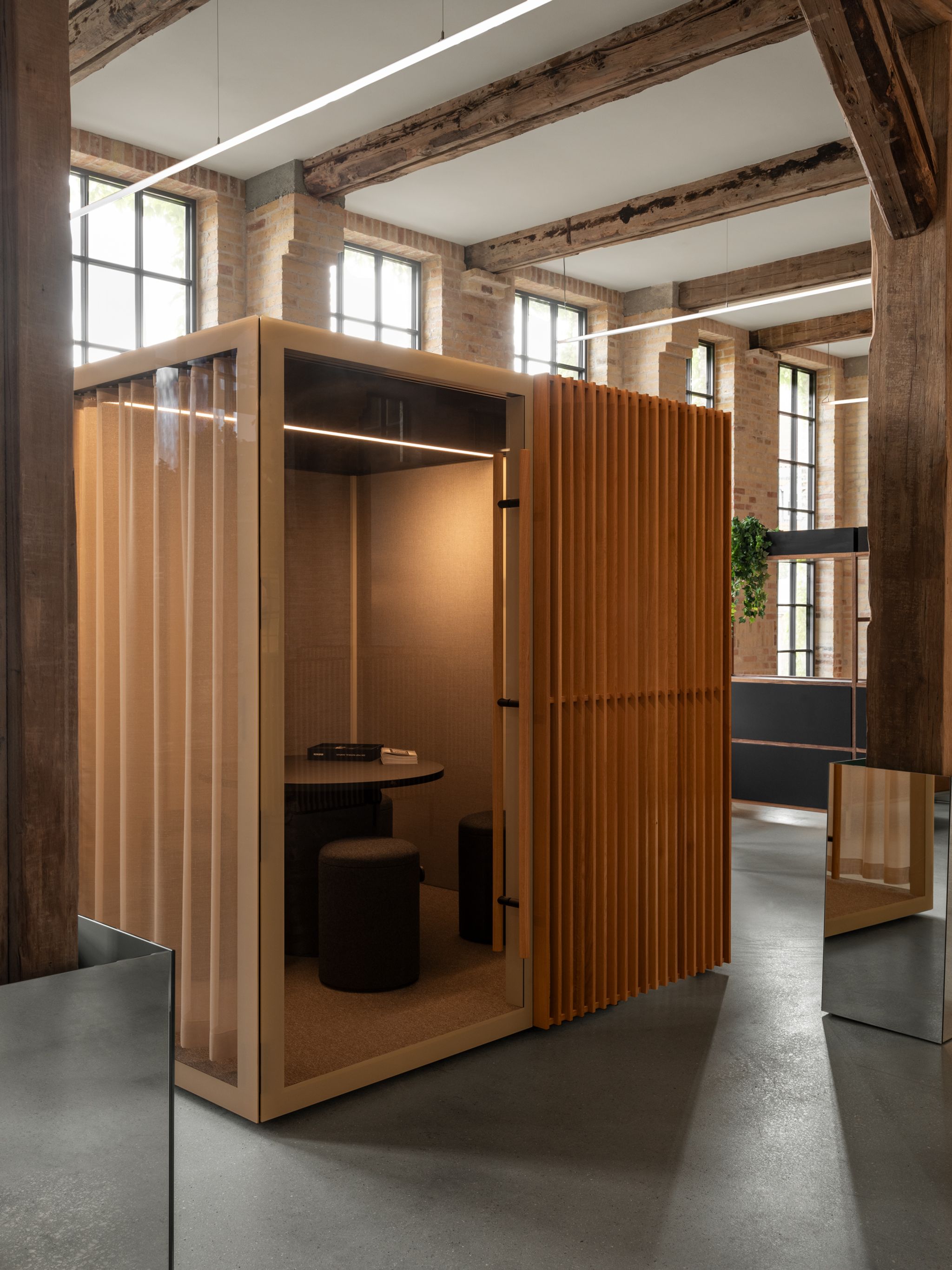 Medium light beige Zen Pod with wooden slats in modern office.