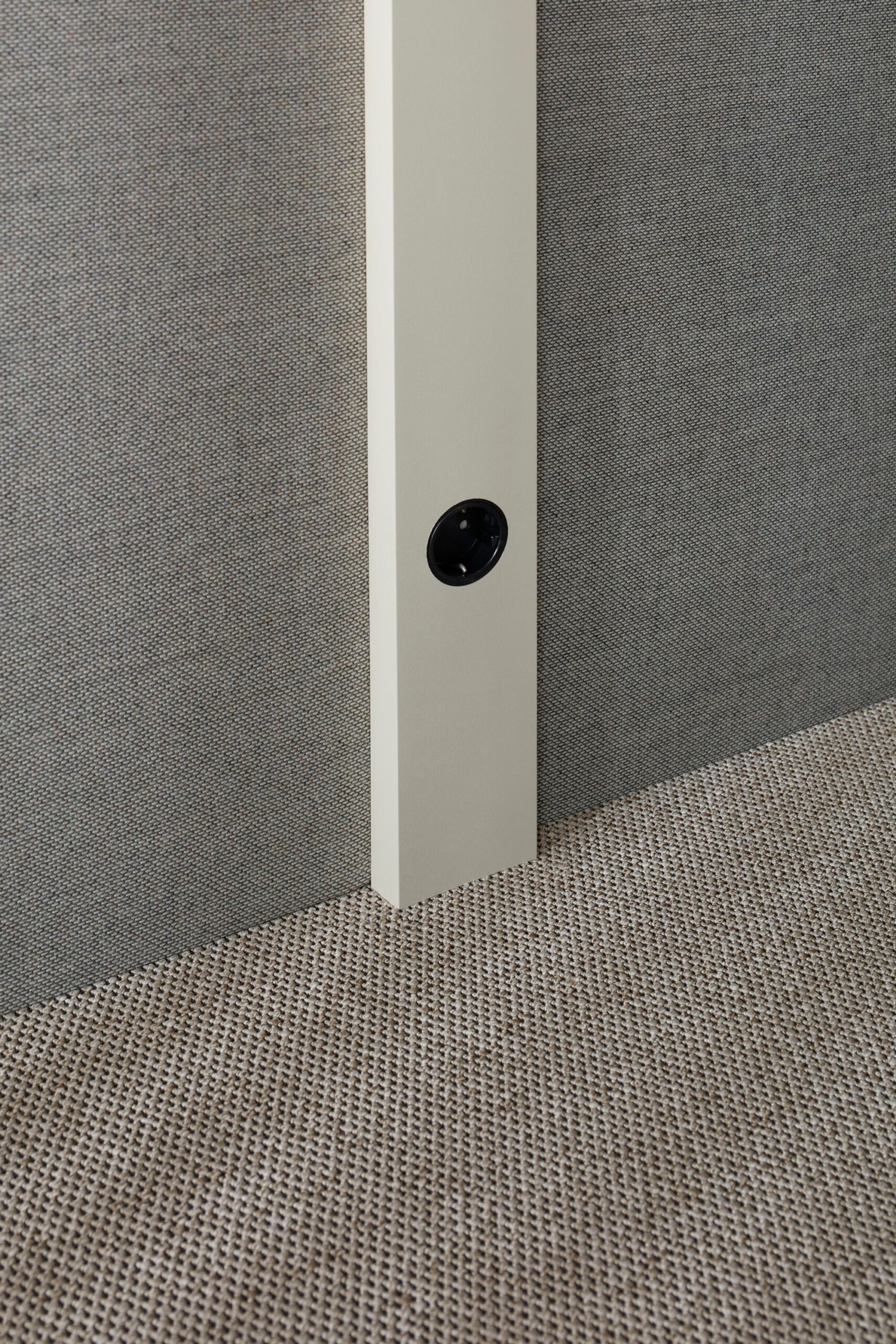 Light beige vertical panel with power socket in Advanced Zen Pod interior.