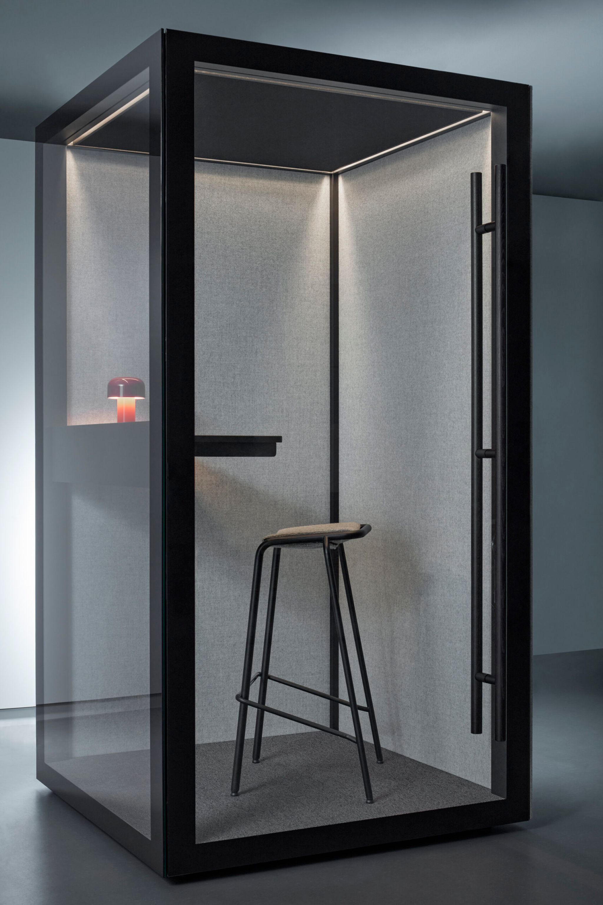 Medium dark Zen Pod with stool and small desk inside