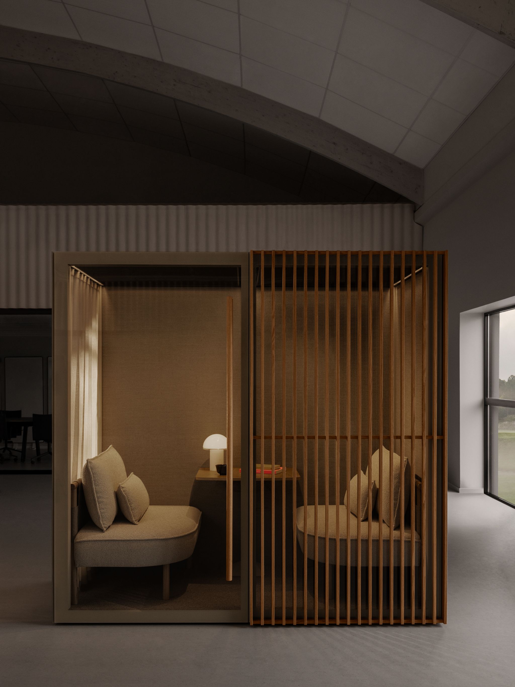 Zen Pod with beige cushioned seats, wooden slat exterior, small table, and soft interior lighting in a modern office space.