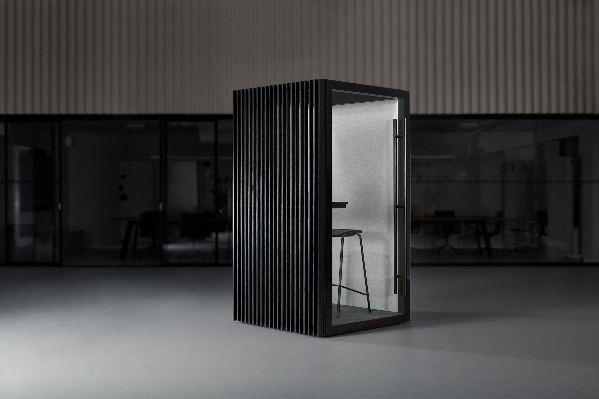 Medium dark Zen Pod with stool inside in empty room