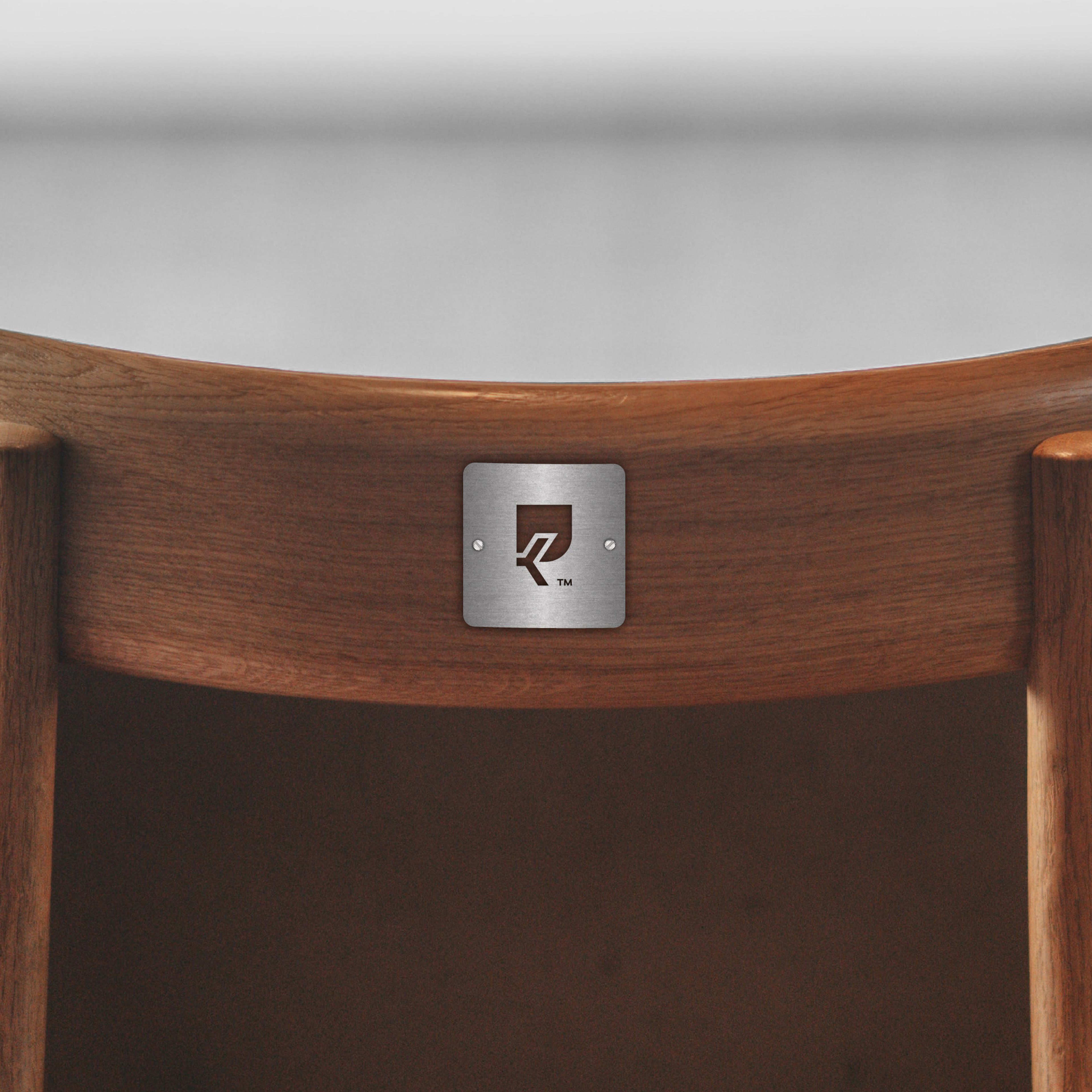 Karrige Pogradeci logo design — Seat with Character | BoldCrest