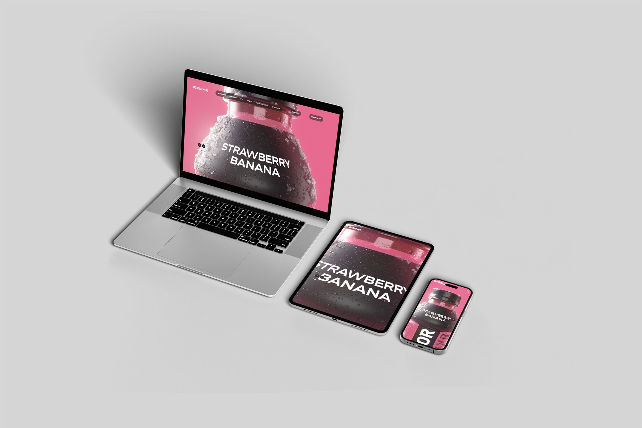 Laptop, tablet, and smartphone displaying the Bodyarmor Strawberry Banana product page in a clean, responsive mockup layout