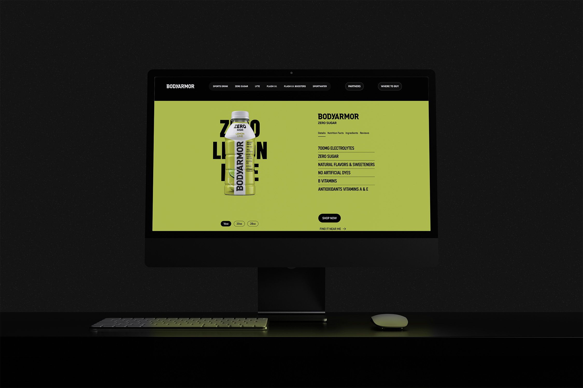 Desktop monitor displaying the Bodyarmor zero sugar lemon lime sports drink product page with bottle imagery, nutrition highlights, and purchase options on a green background