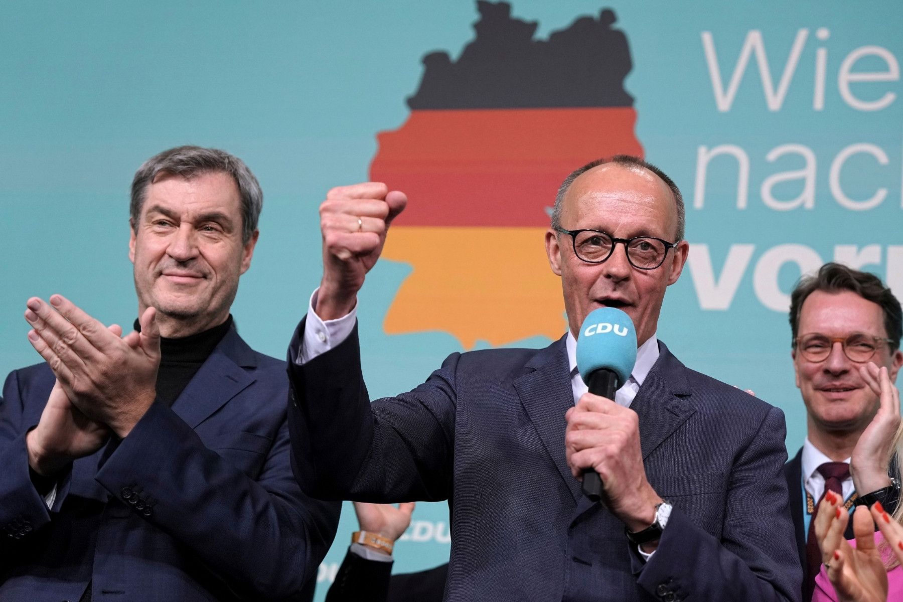 Friedrich Merz, front right, leader of the Christian Democratic Union (CDU) after the German national election. Photo: Michael Kappeler/dpa via AP).