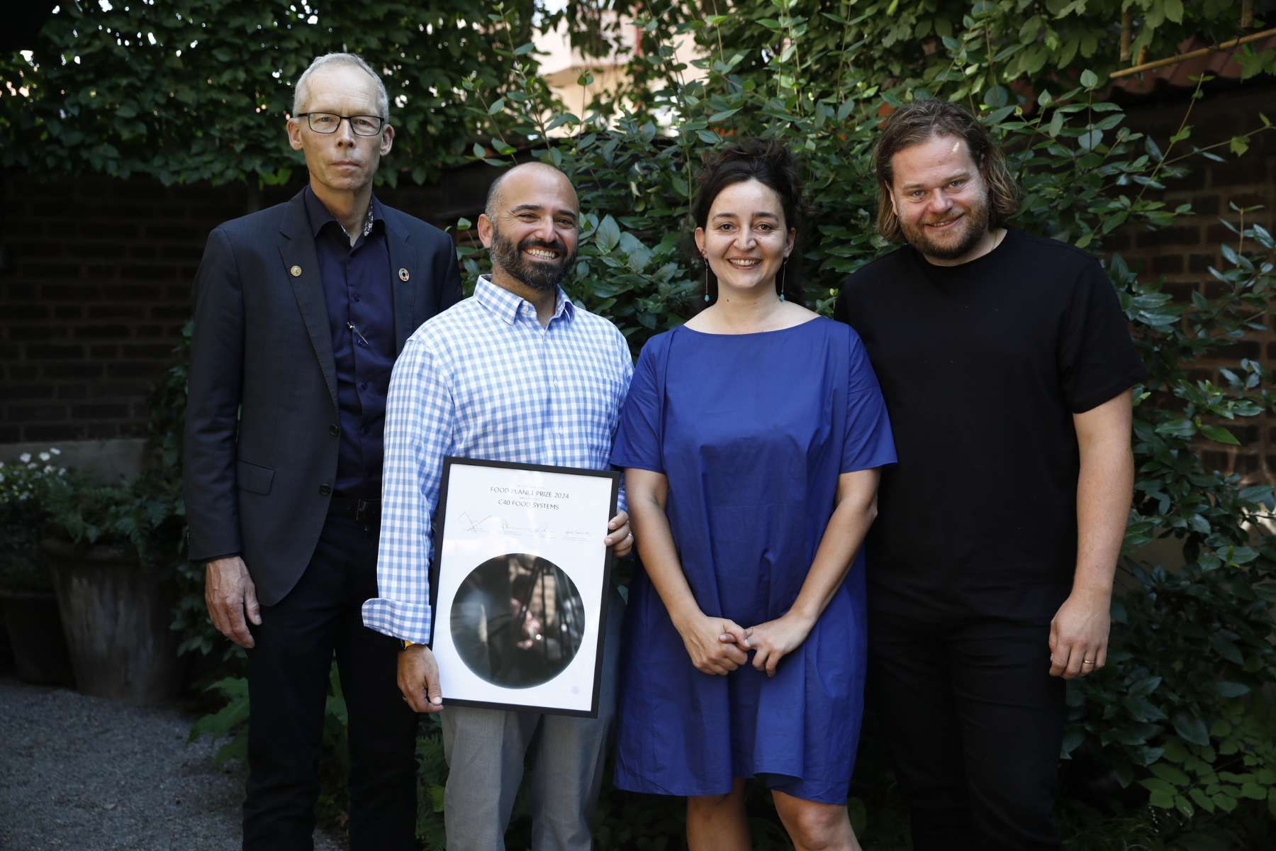 Stefania Amato och Zachary Tofias, C40 Food Systems (mitten). Johan Rockström (t.v.) och kocken Magnus Nilsson (t.h.). Foto: Mickan Mörk / TT.
