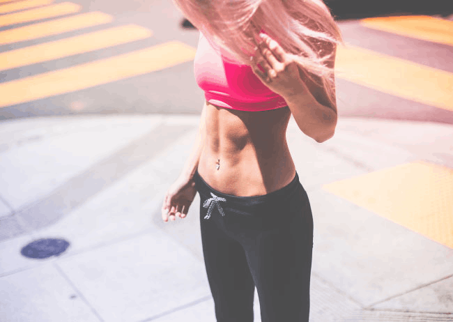 A photograph of a woman wearing fitness apparel | IDID Gastroenterology
