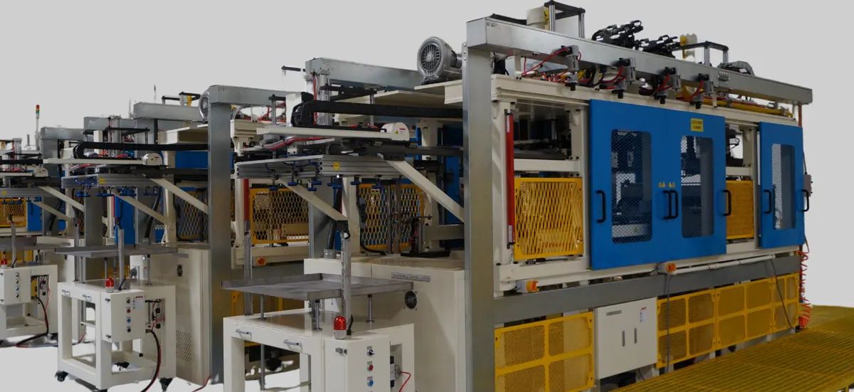 Row of full-servo moulded fibre machines