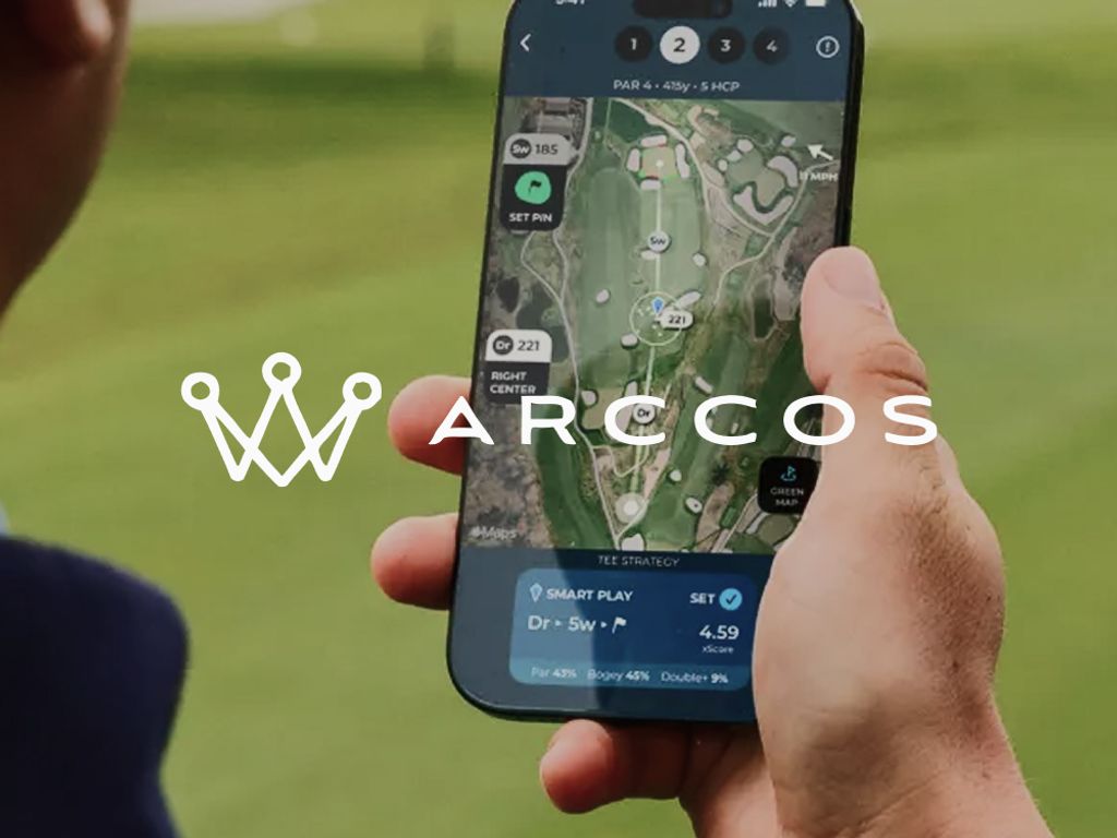 Arccos logo over a hand holding a phone showing a golf hole GPS map