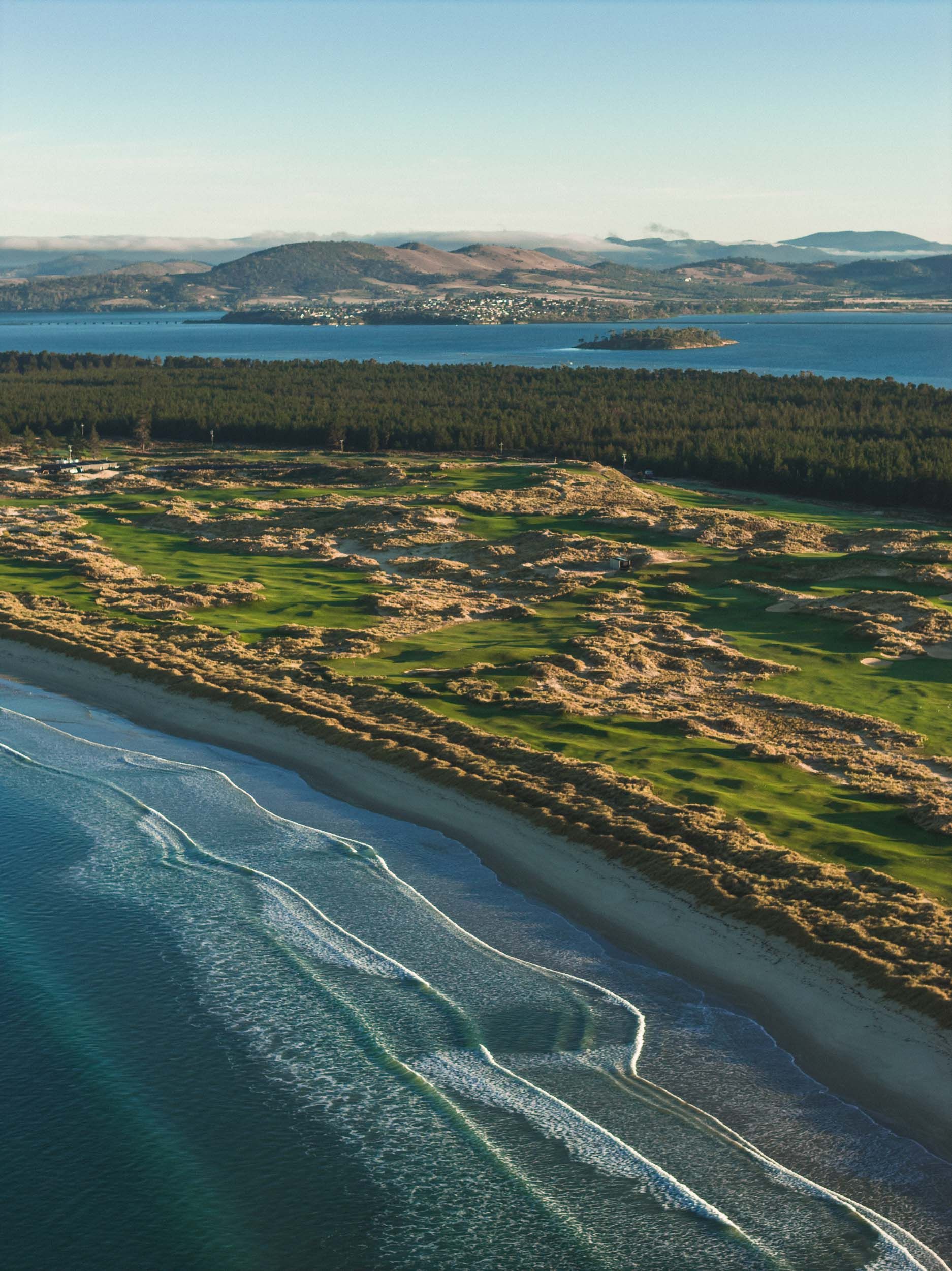 Aerial view of Seven Mile Beach golf links beside the sea near Hobart, Tasmania