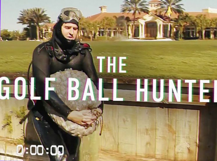 The Golf Ball Hunter title over a diver in a wetsuit holding a bag of golf balls