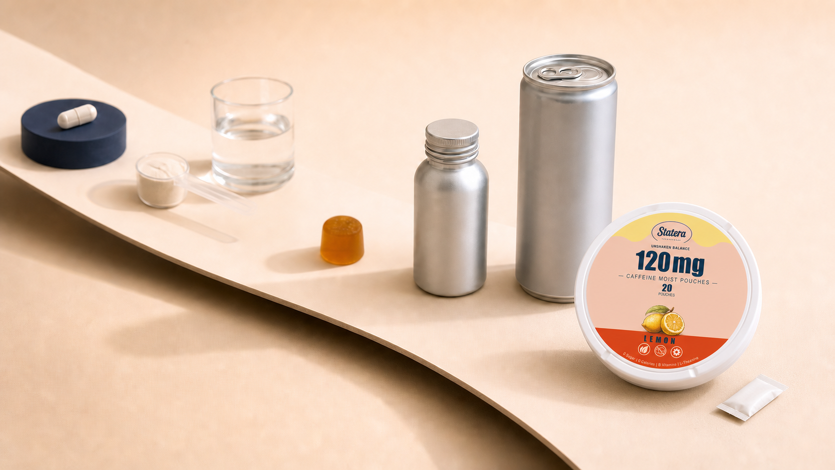 STATERA Lemon 120mg caffeine pouch can and loose oral pouch at the foreground of an editorial pathway featuring a capsule, powder, gummy, shot bottle and drink can