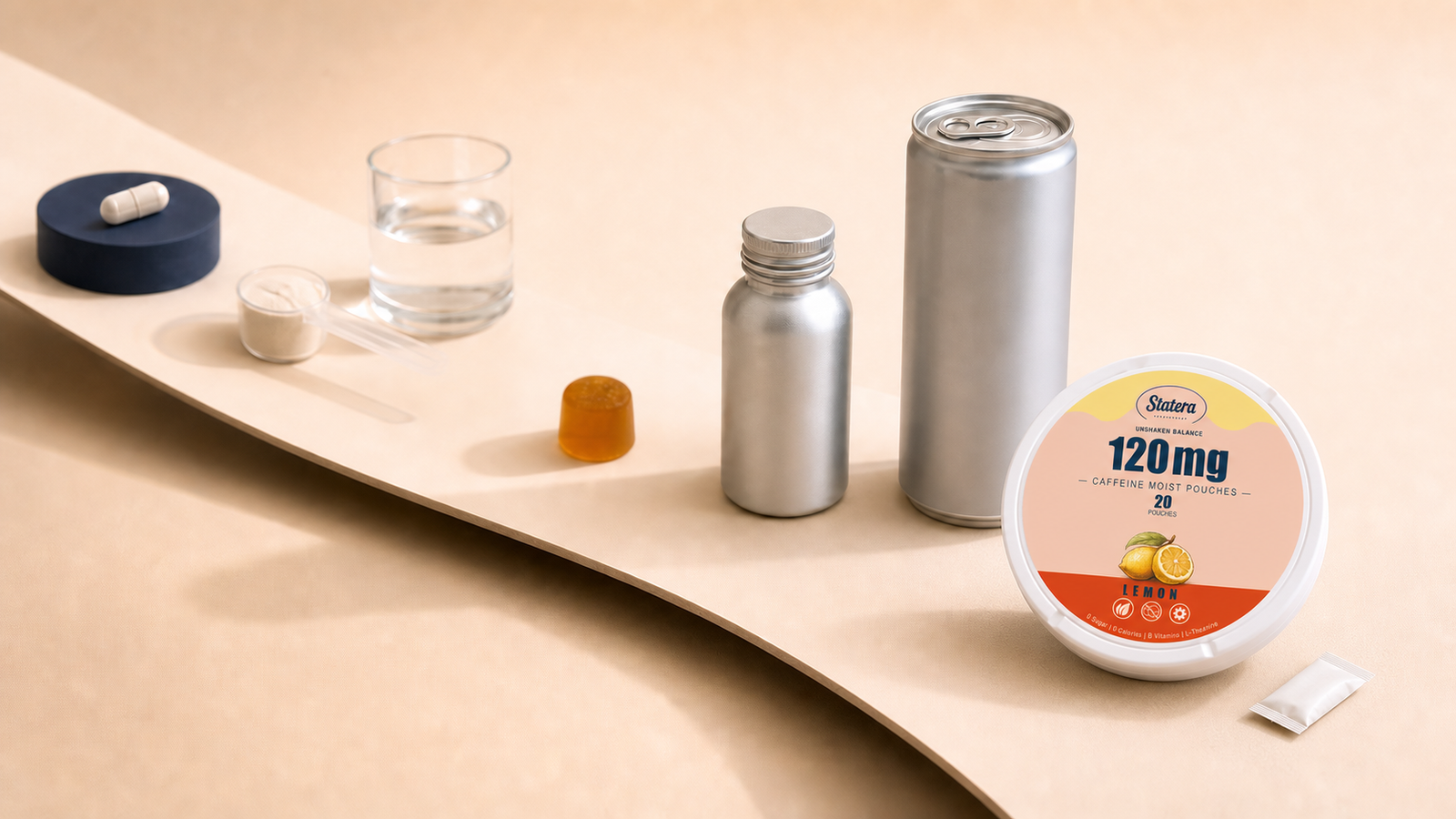 STATERA Lemon 120mg caffeine pouch can and loose oral pouch at the foreground of an editorial pathway featuring a capsule, powder, gummy, shot bottle and drink can