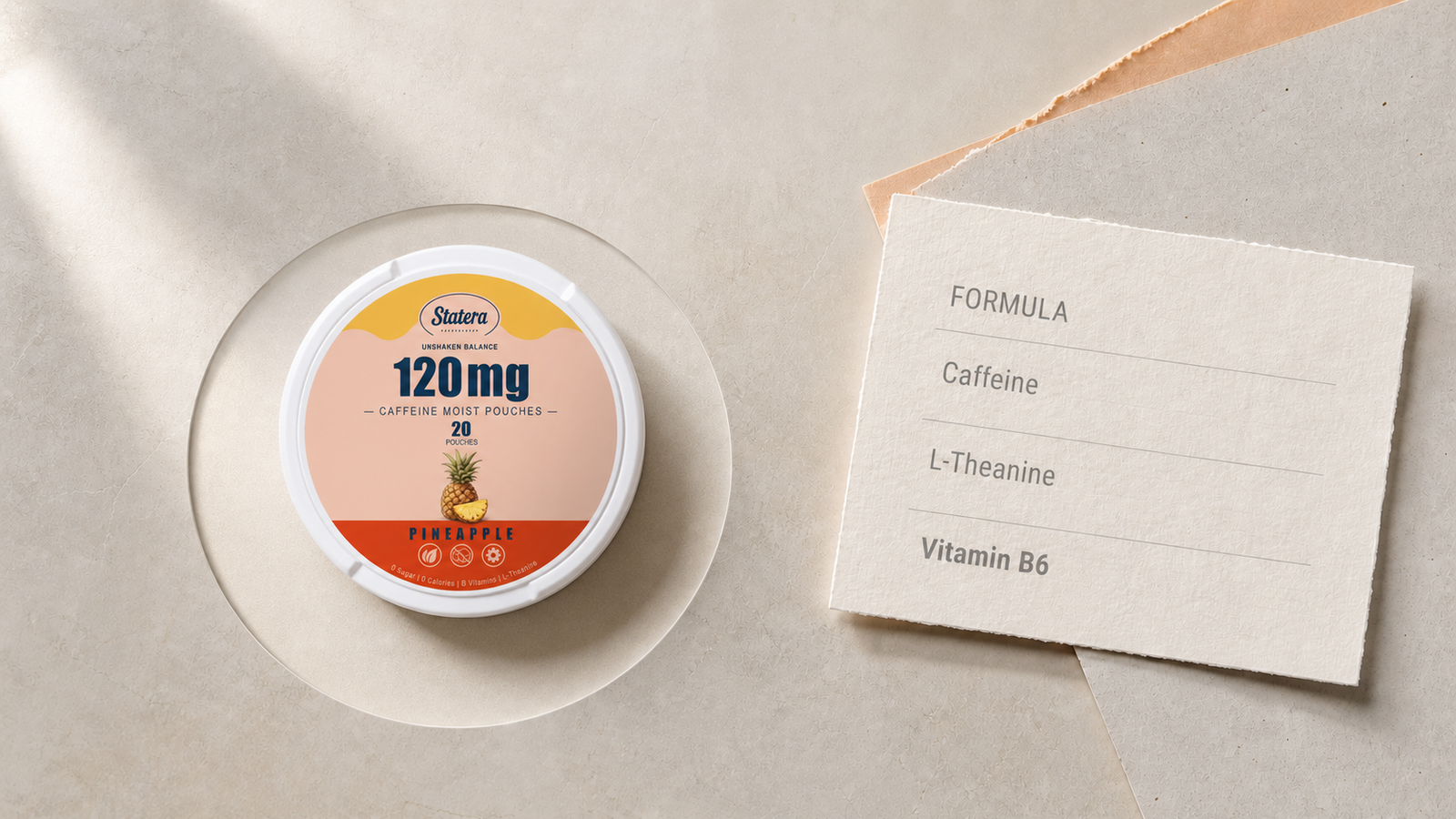 STATERA Pineapple 120mg caffeine pouch can beside a formula card listing Caffeine, L-Theanine and Vitamin B6