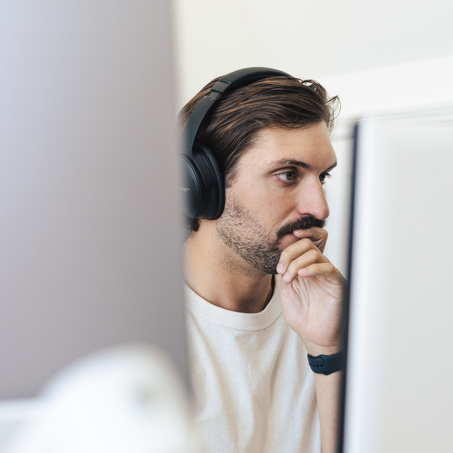 Bryden in the office, working on coding agents. Photo credit: Kelly Nyland.