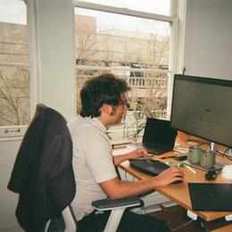 person working on a computer at a desk