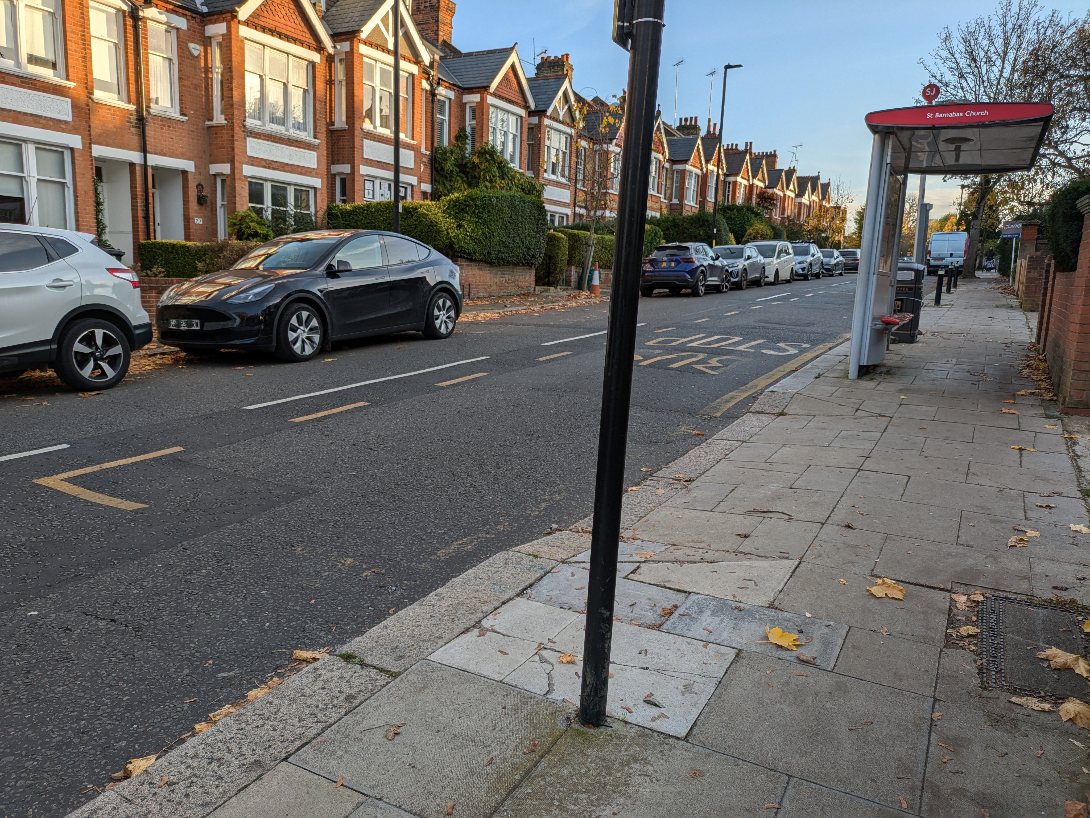 This bus stop is positioned between two crossovers – passengers boarding or alighting the bus have to step up / down further than for pavement level (photo: Christine Eborall)