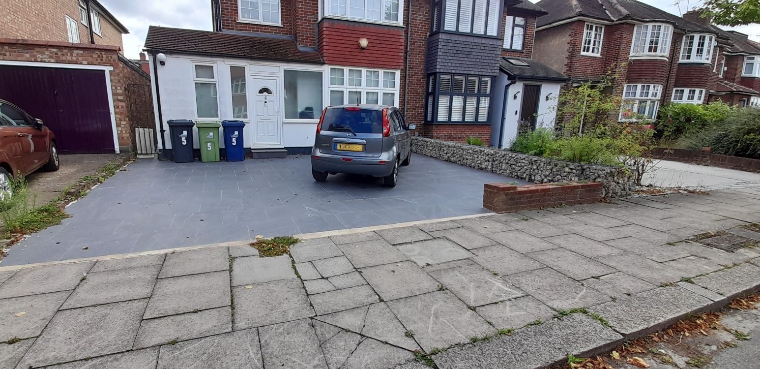 completely paved over front garden