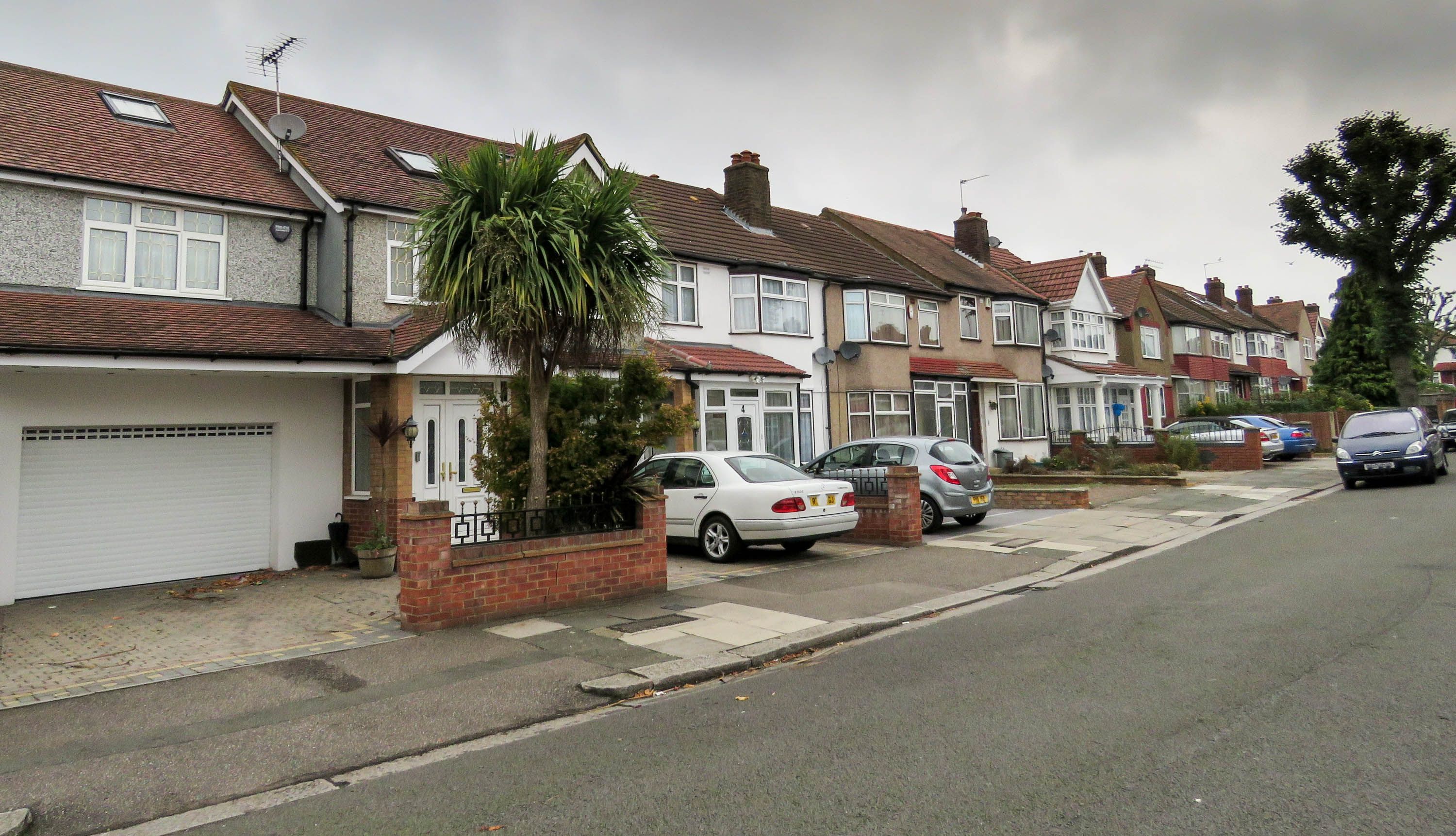 A typical suburb street in Greenford, London Borough of Ealing, with a crossover in front of each house