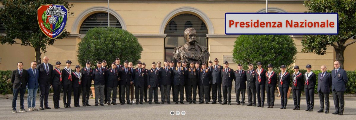 Members of the ANC standing in a line in front of the National Presidency building in Rome.