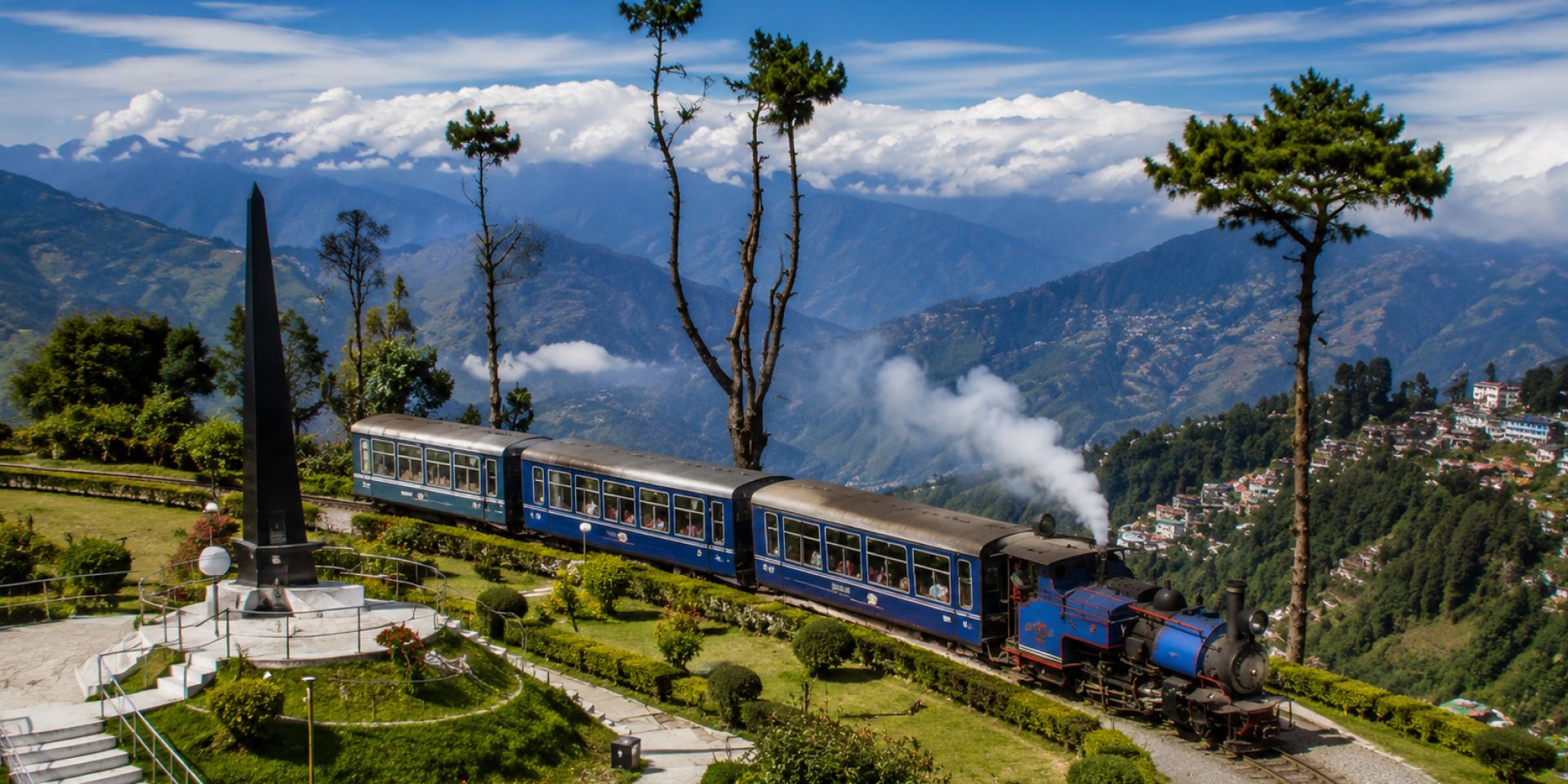 Lush green terraced tea gardens of Happy Valley Tea Estate in Darjeeling