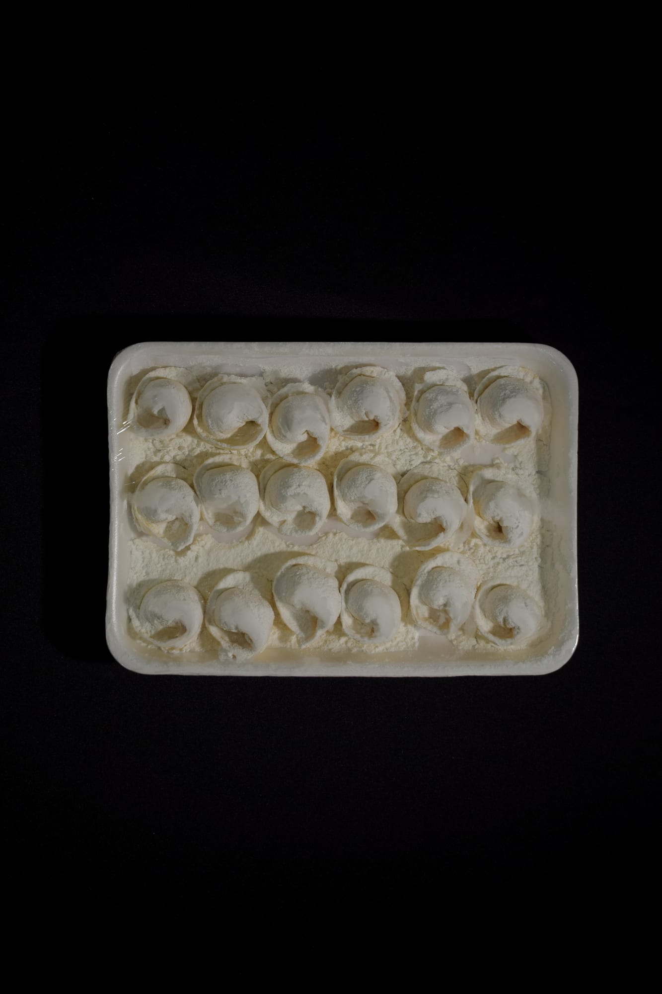 Agnolottis con jamón y queso