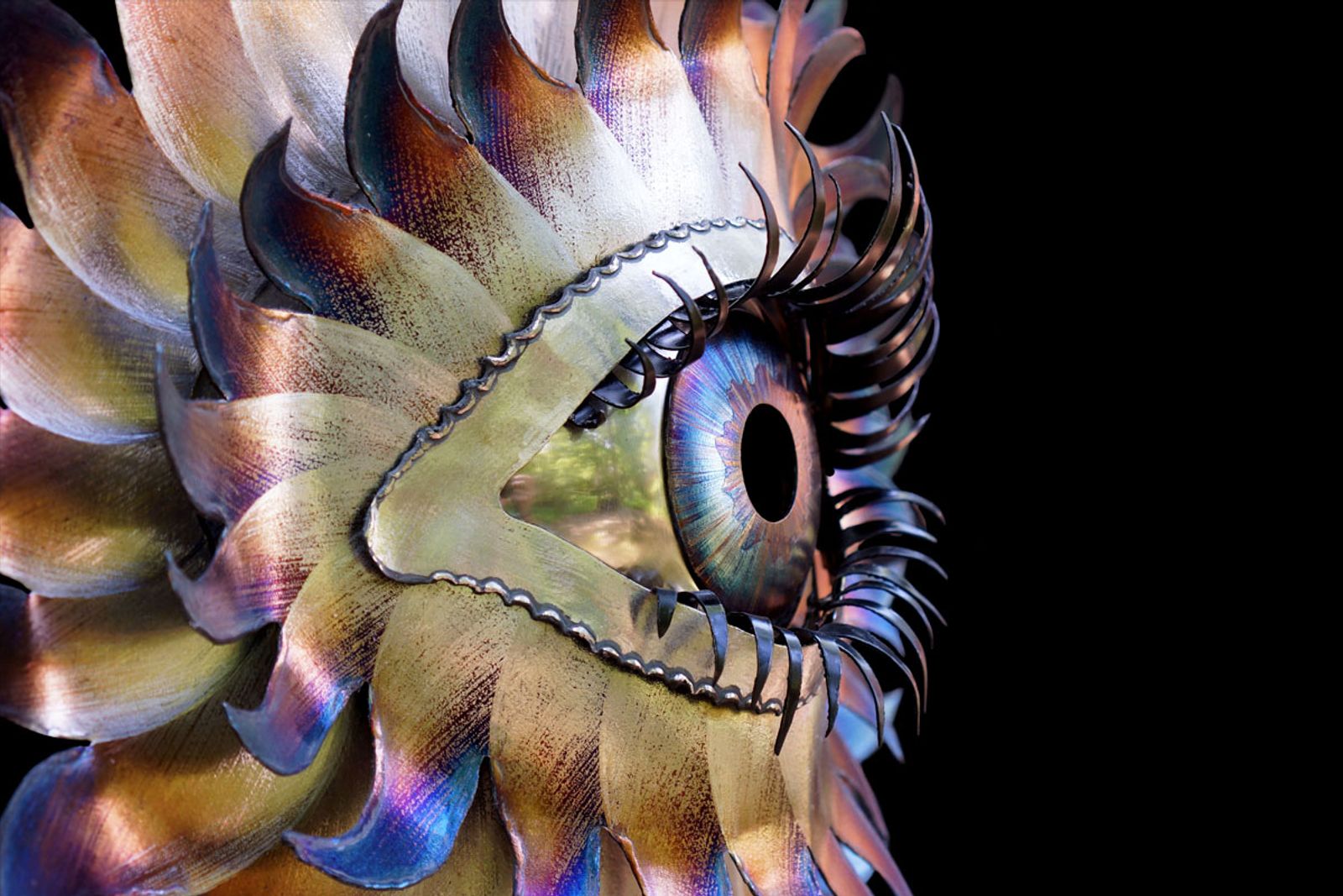 Close up of stainless steel flowering eye sculpture