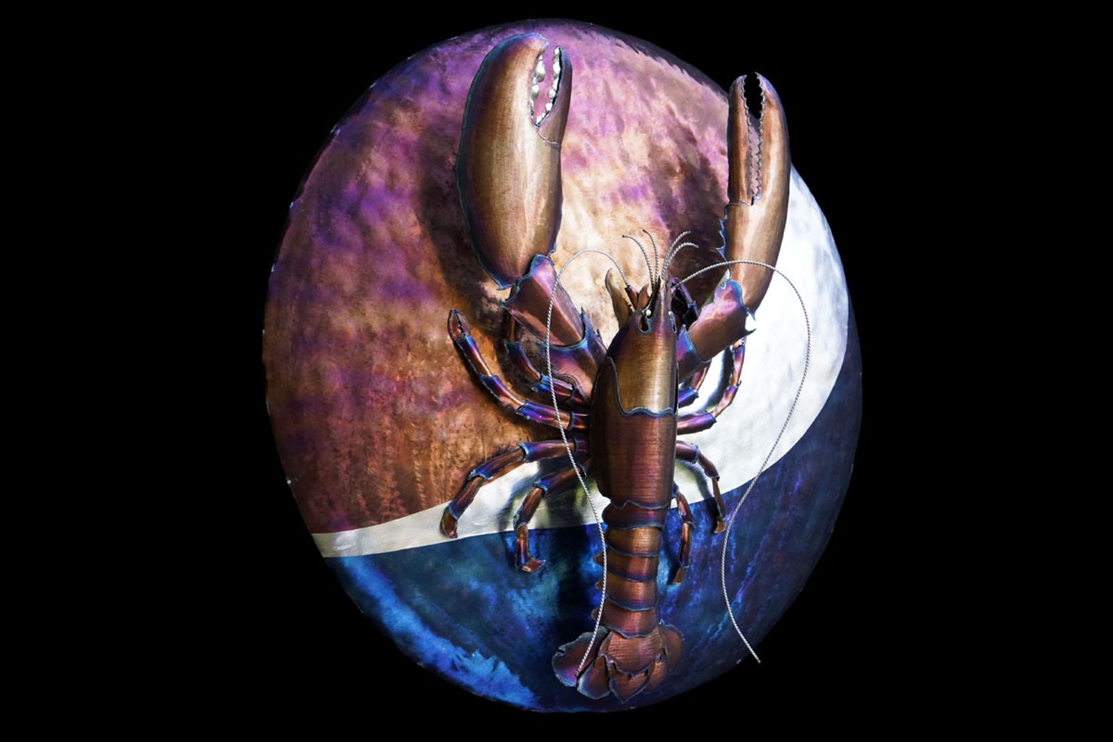 Tilted side view of metal Pepsi Red Lobster crossover commission.