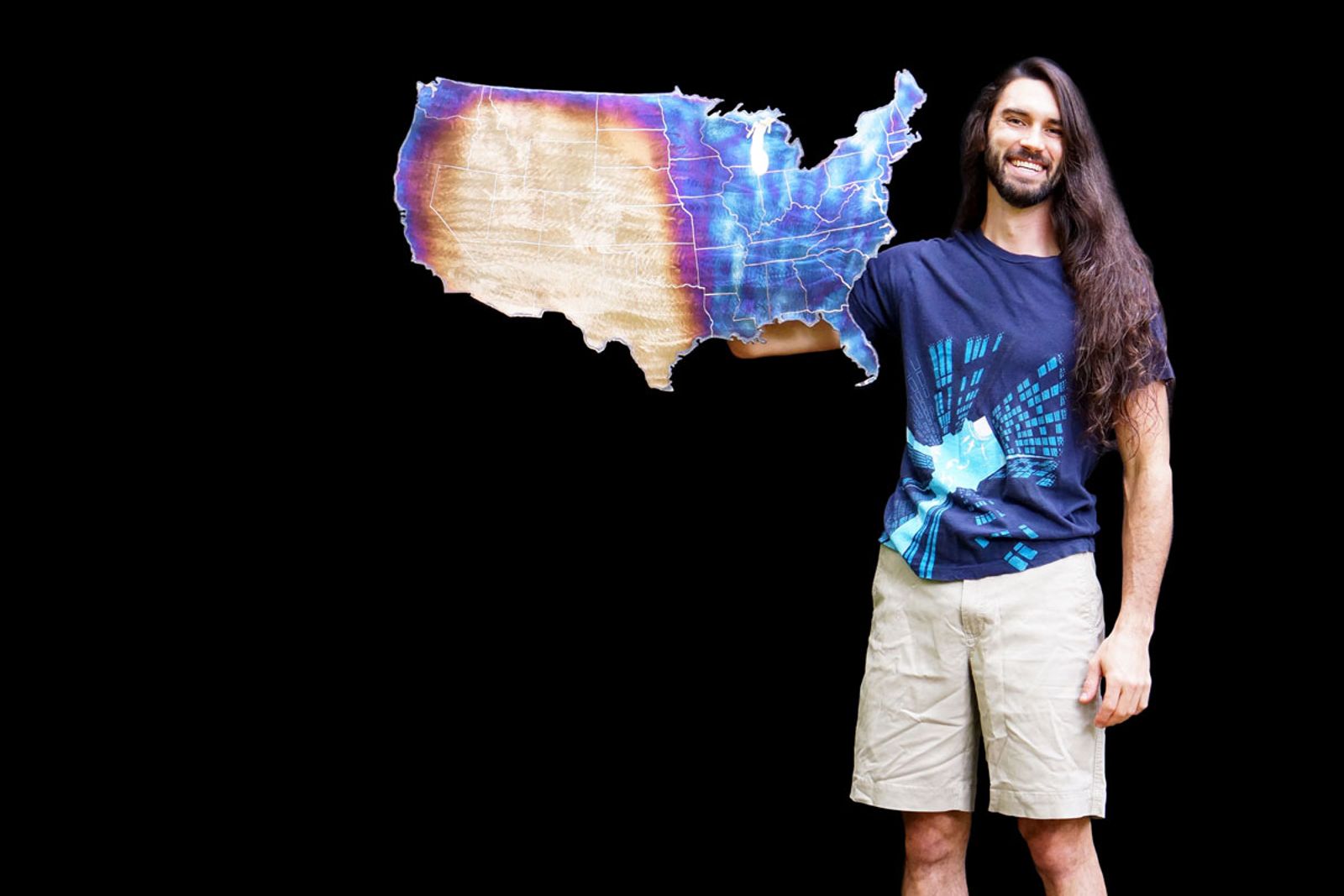 Artist Aiden Dale with metal map of the United States