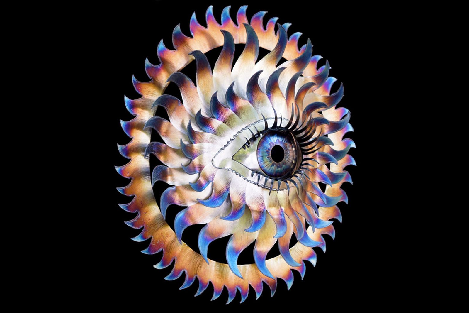 Stainless steel flowering eye sculpture tilted