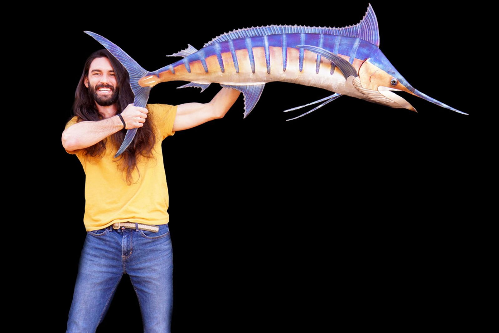 Artist Aiden Dale with metal marlin sculpture