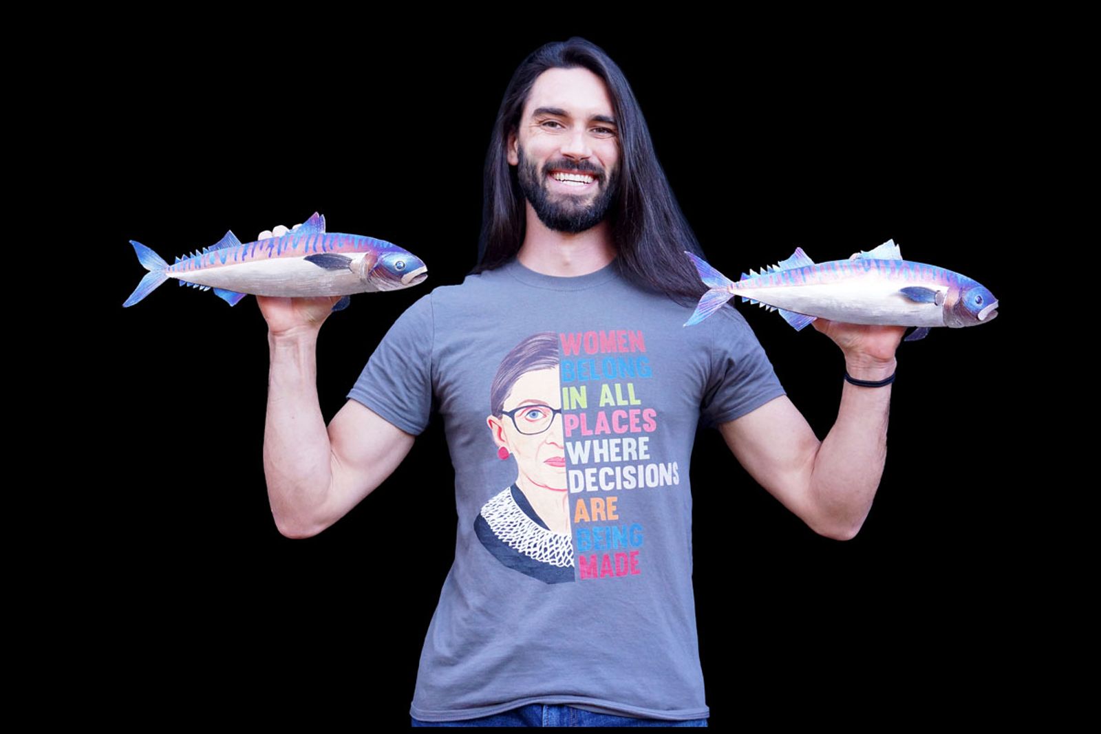 Artist Aiden Dale with metal mackerel sculptures