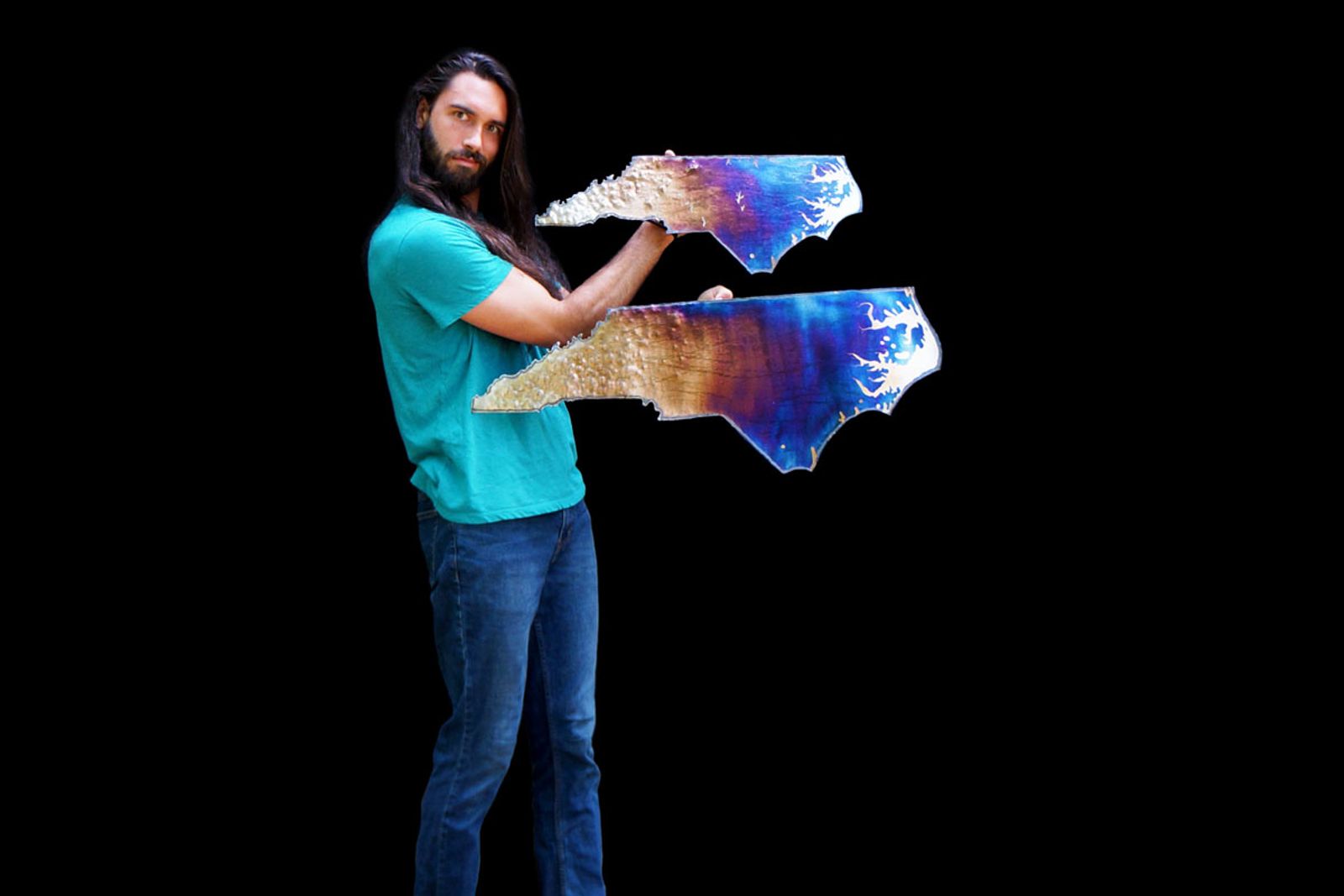Artist Aiden Dale with metal NC maps